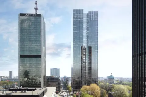 Nowoczesne wieżowce, w tym Marriott i roma tower, dominują nad panoramą miasta.